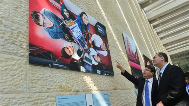 Yisrael Katz and Ofir Akunis at Ben-Gurion Airport exhibit