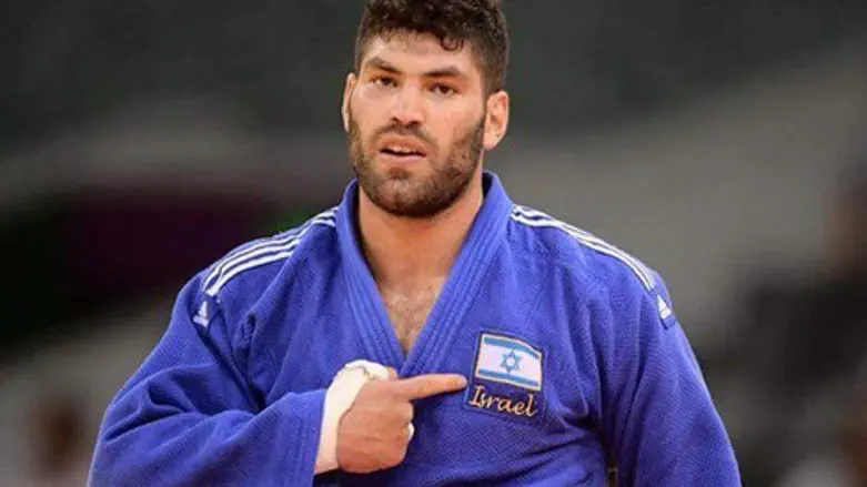 הביא מדליה. אורי ששון