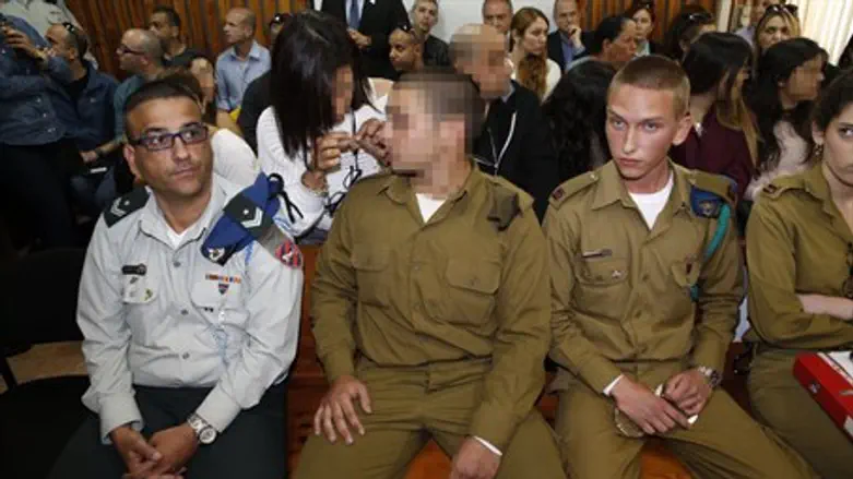 Soldier charged over shooting Hevron terrorist appears in court