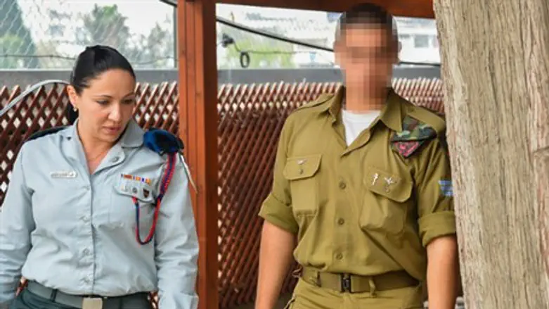 Soldier who killed wounded terrorist arrives in court