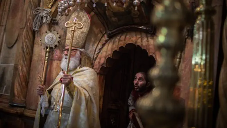 Armenian priest exists Jesus' Tomb at the Church of the Holy Sepulchre
