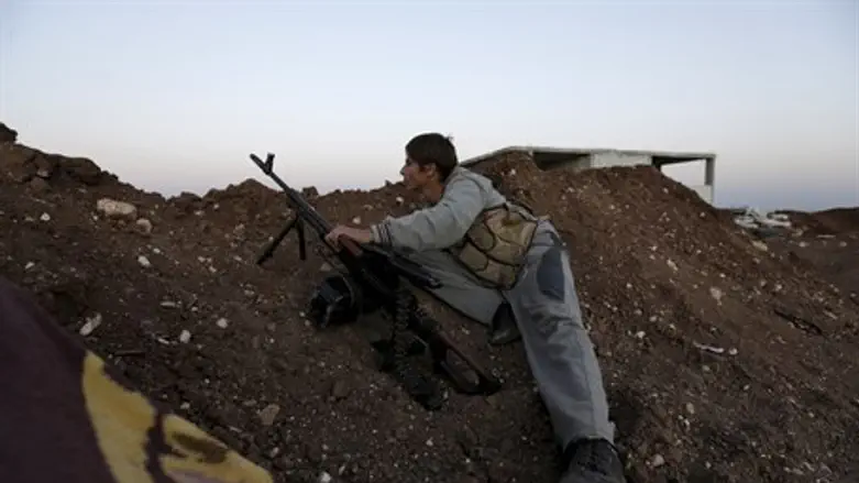Syrian rebel during clashes near Aleppo