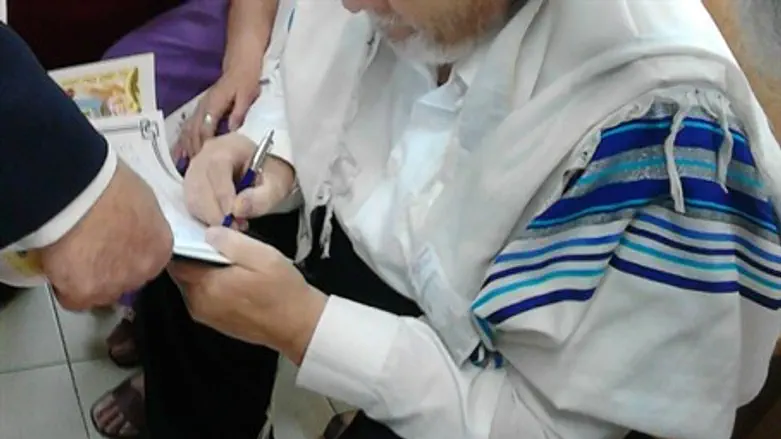 Y. and his wife convert