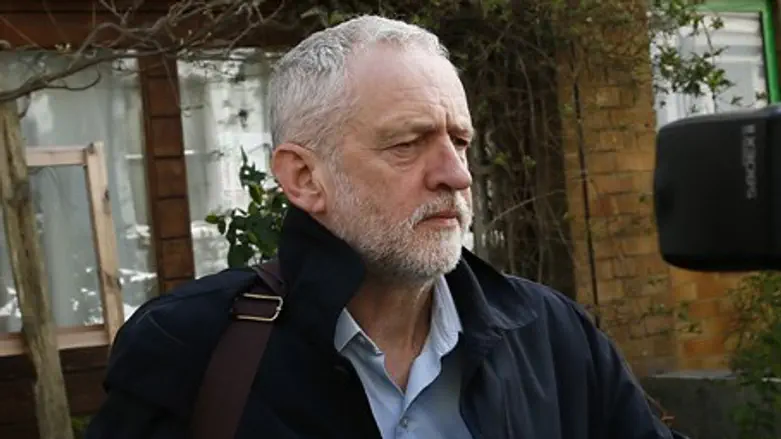 Jeremy Corbyn faces reporters outside his home after suspending Ken Livingstone