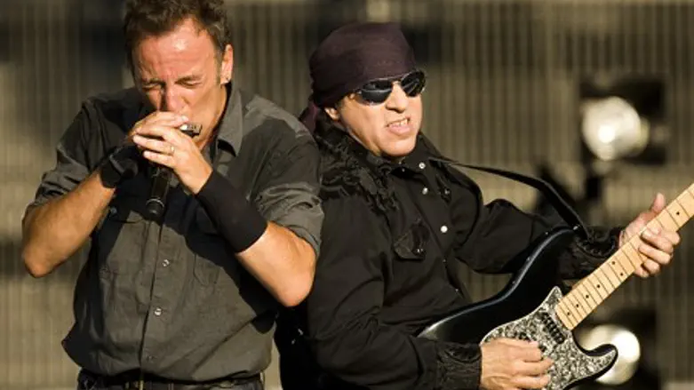 Steven Van Zandt (R) performs with Bruce Springsteen