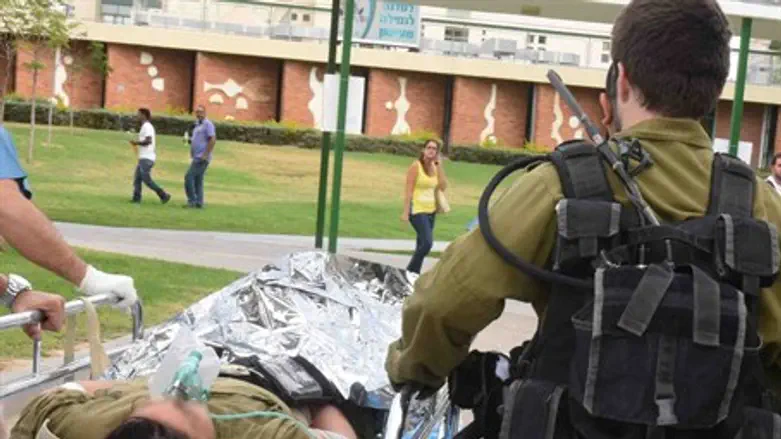 Injured soldier being transported to hospital (illustrative)