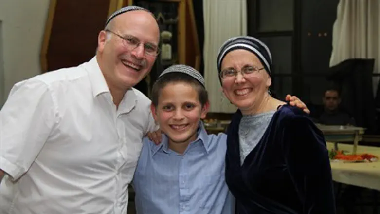 Devra and Gidon Ariel with Chaim Tzvi