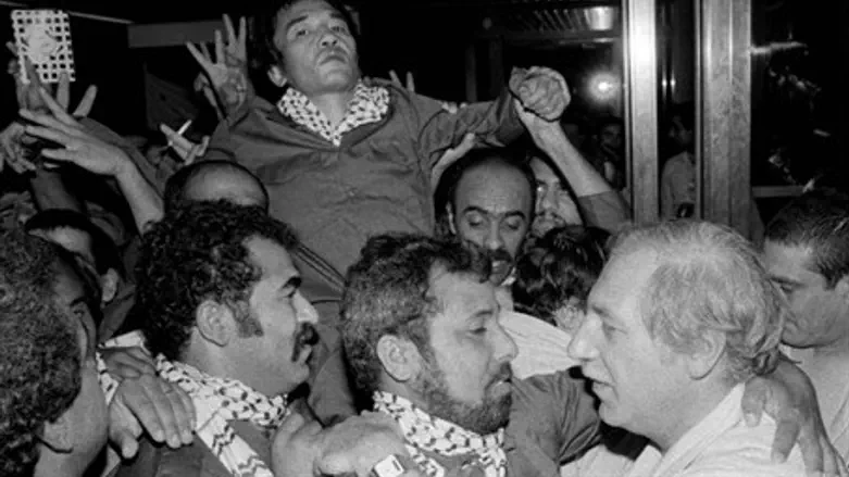 Kozo Okamoto, center-top, upon release