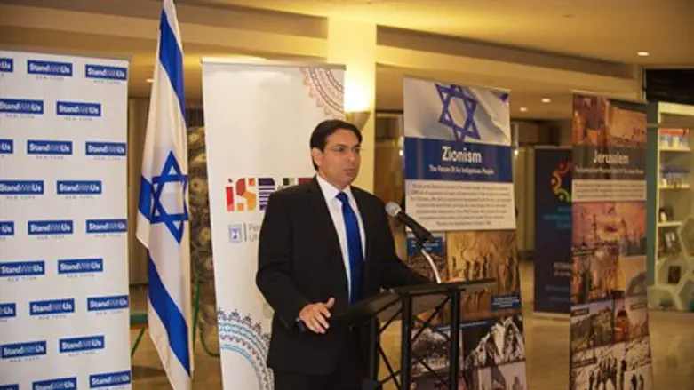 Danny Danon with the exhibit