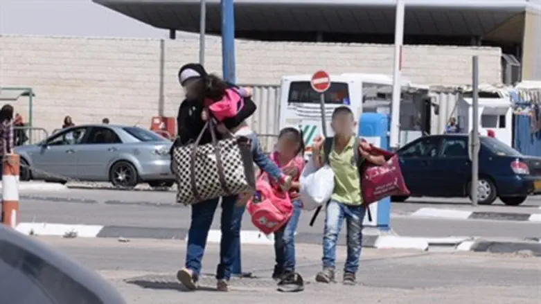 A. entering sovereign Israel with children after rescue