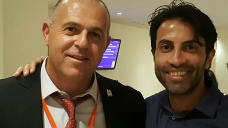 Hassan (R) with Avi Naim (L)