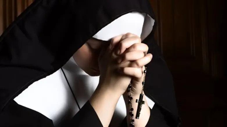 Nun praying (illustration)