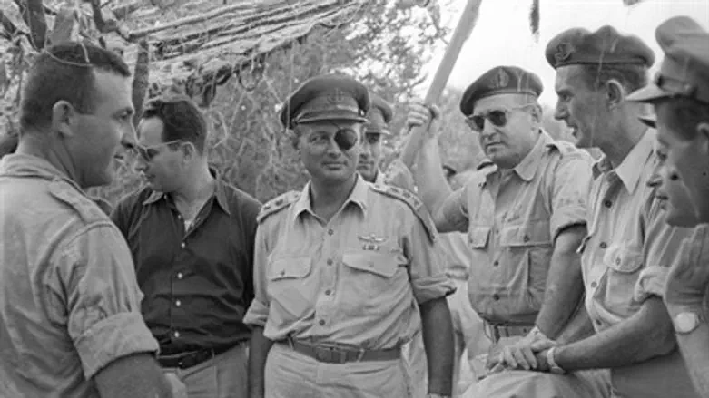 Officers including Moshe Dayan (with eyepatch) and Binyamin Gibli (on right)