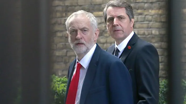 Labour leader Jeremy Corbyn (L)