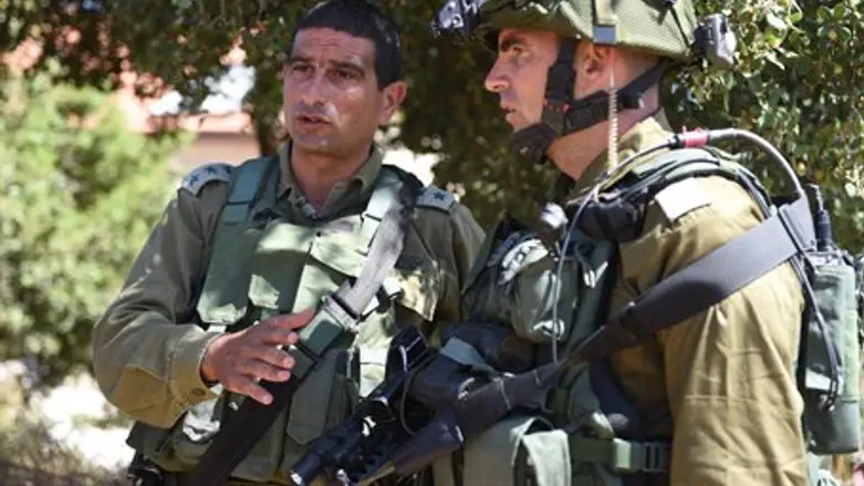 Комбриг Иегуда Бен Эзра на месте теракта