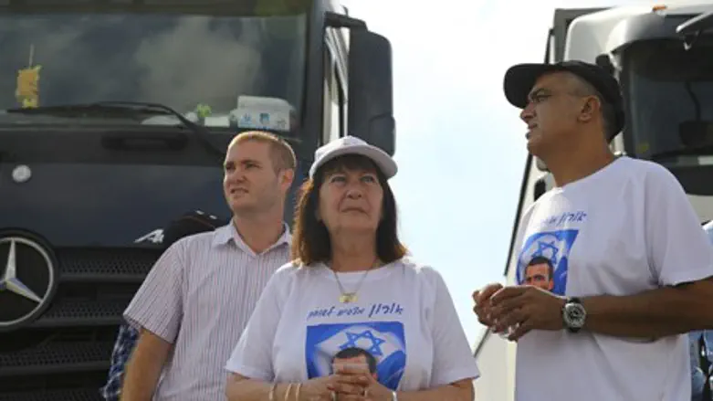 Family of Oron Shaul block t aid truck into Gaza during protest