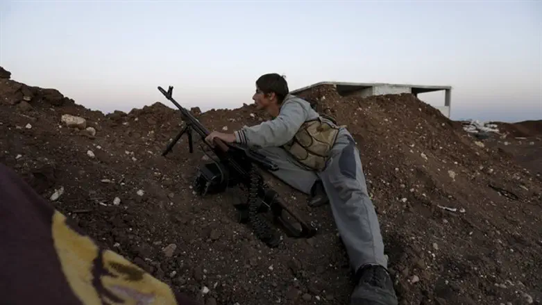 Syrian rebel during clashes near Aleppo