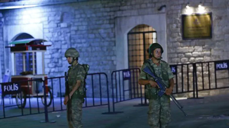 Turkish military stand guard near the Taksim Square in Istanbul