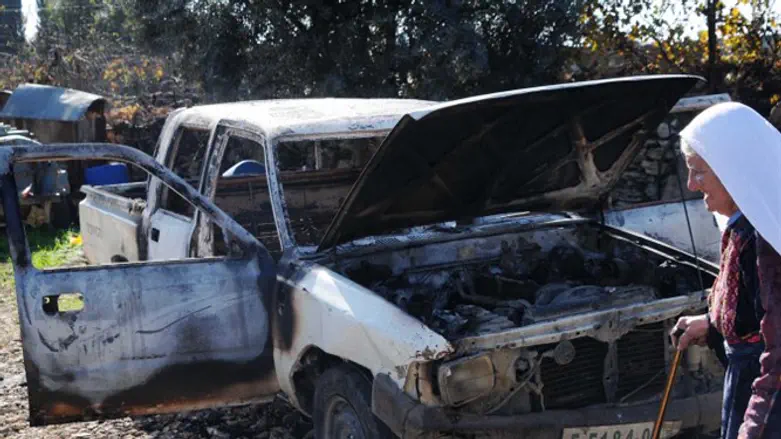 Car damaged by arson (illustrative)