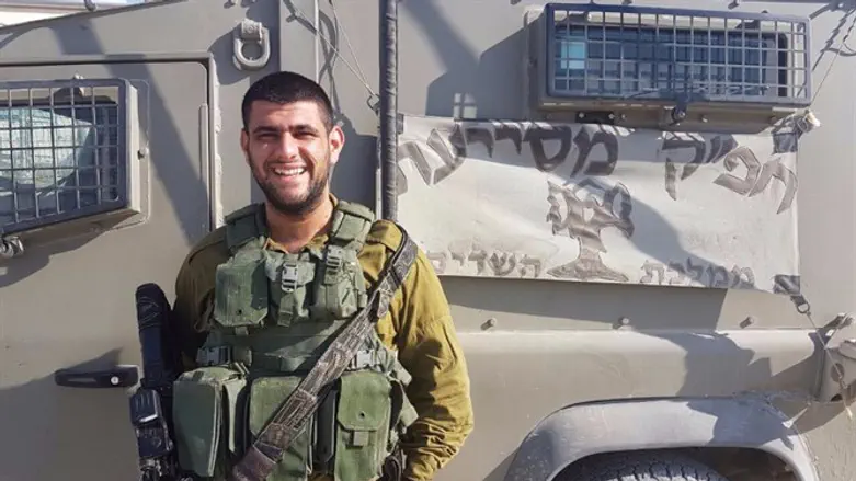 Protecting his home. Yaakov Azrayev