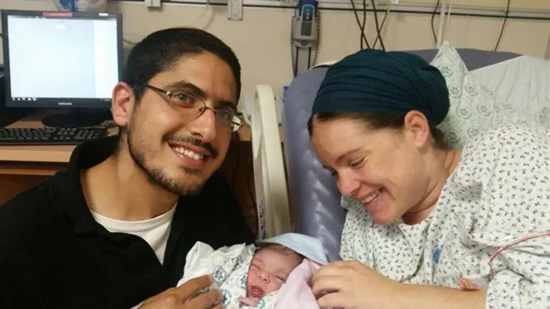 ענבר, בעלה אורי ובנם הקטן