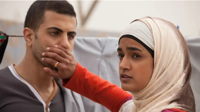 Jalal Masarwa, left, and Lamis Ammar in a scene from "Sand Storm"