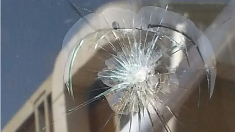 Bus window broken by Bedouin 'Price Tag' attack