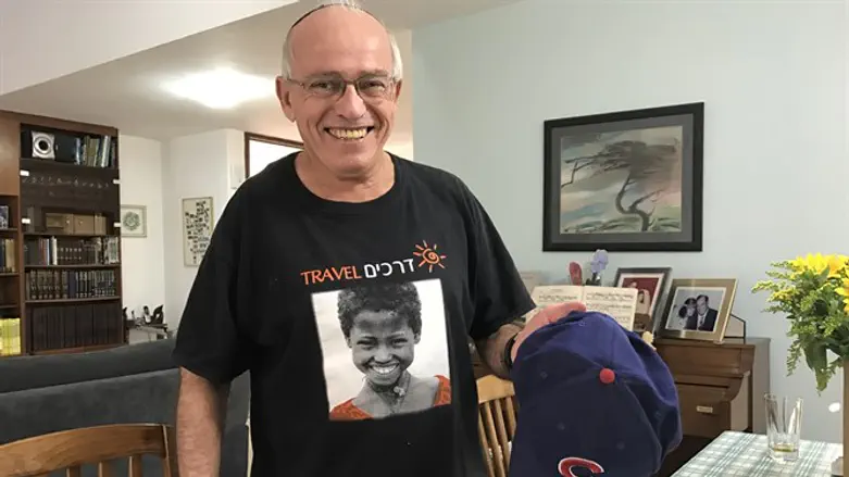 Michael Rich displaying his Chicago Cubs cap at his house in Karnei Shomron