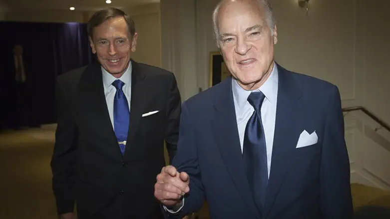 Henry Kravis (right)
