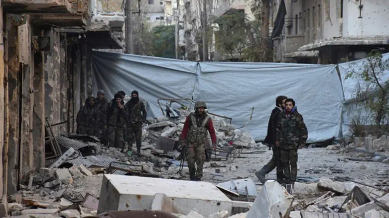 'We are not afraid of the Hague court:' Assad's soldiers in Aleppo 