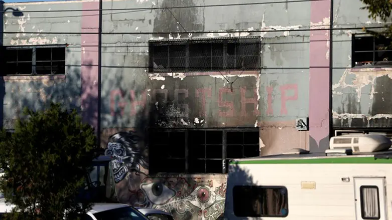 Charred remains of building where at least 9 died in a three-alarm fire in Oakland