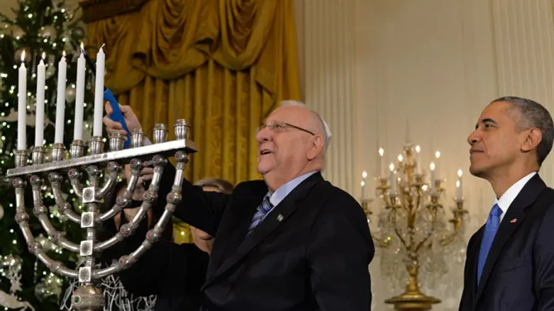 President Rivlin lights Hanukkah candles in the White House