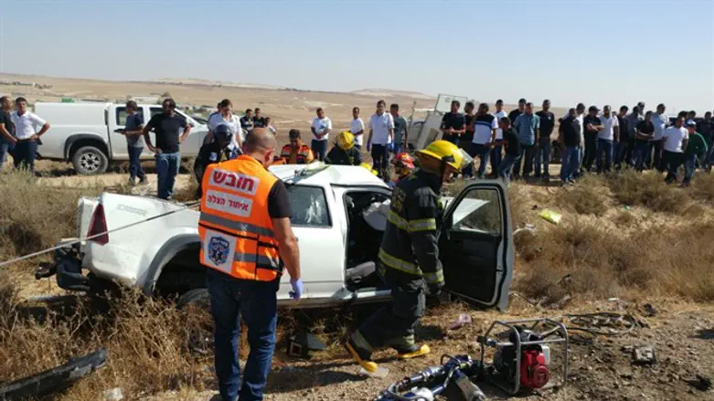 A United Hatzalah responds to a car accident victim. Illustration