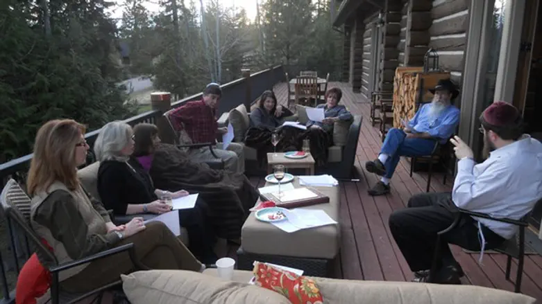 Jewish community members in Whitefish gather for a Torah class with Rabbi Chaim Bruk