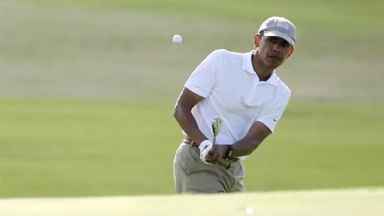 Obama playing golf
