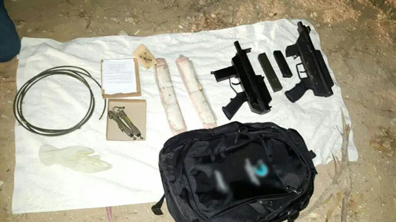 Guns, drugs confiscated in raid