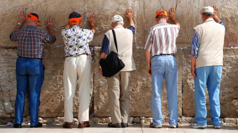 Tourists at Kotel (Western Wall) in Jerusalem