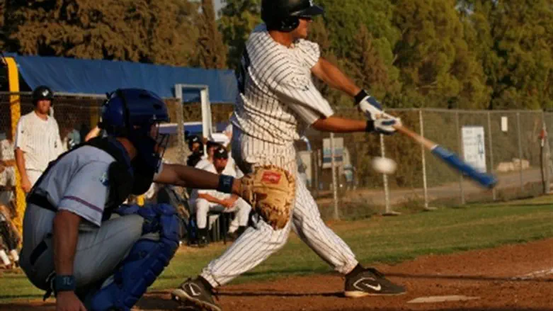 Strike One! Israel baseball player in game at Kibbutz Gezer in 2007