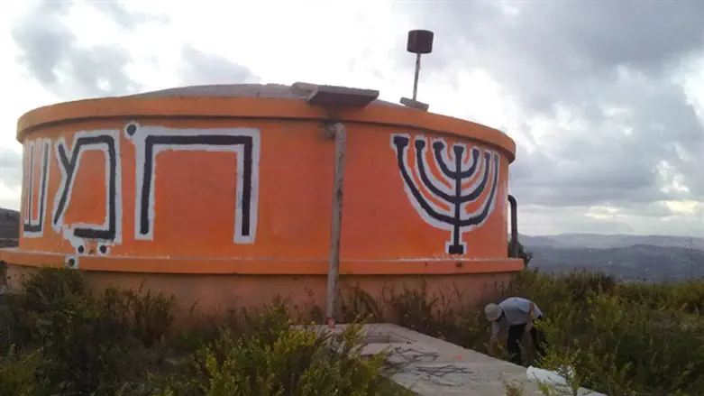 The repainted water tower at Homesh