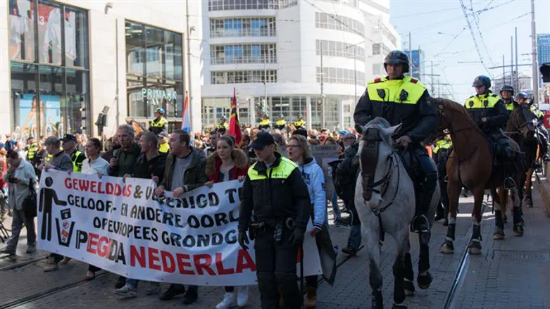 Demonstrators protesting against the arrival of Muslim immigrants to Europe in The Hague,