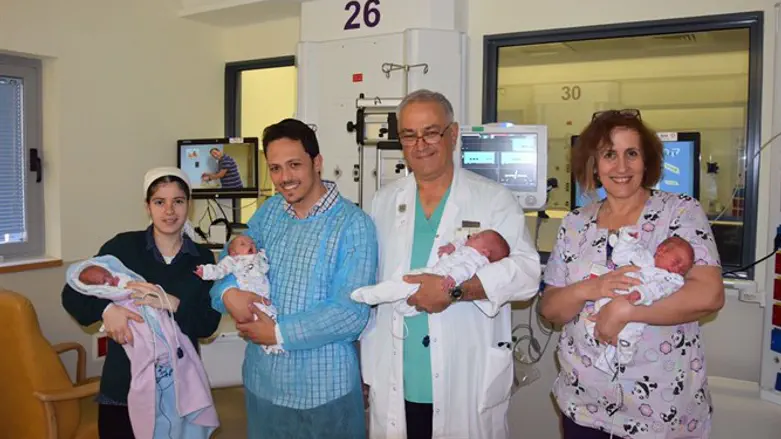 The parents, the quads and Dr. Samuelov