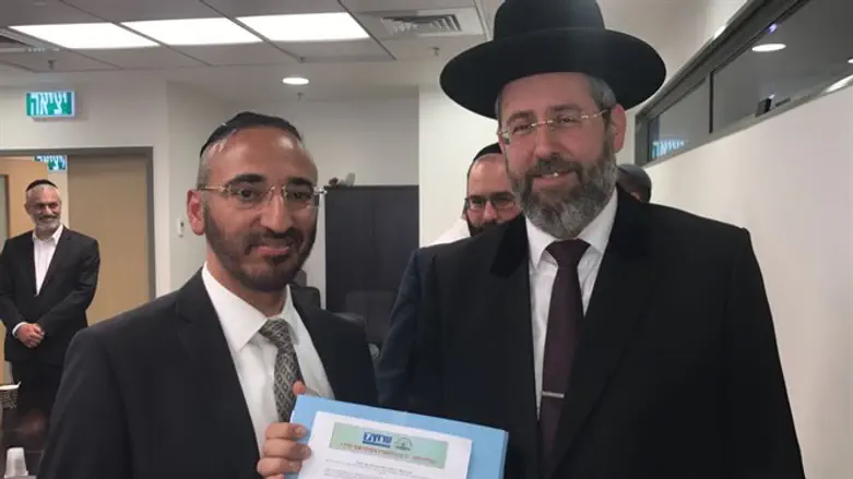 Раввин Лау и исполнительный директор главного раввината