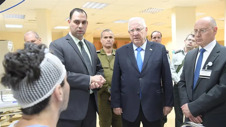 President Rivlin visits wounded Syrians