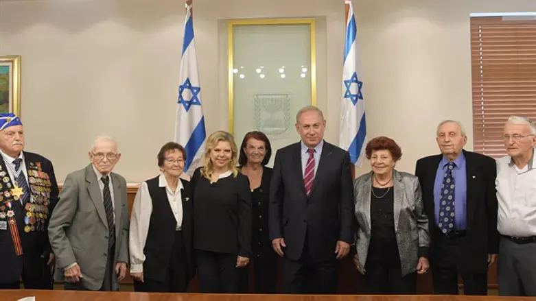 PM with torchbearers