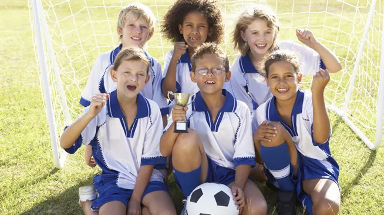 Children playing soccer
