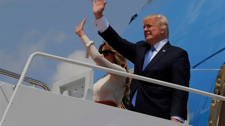 President Donald Trump and first lady Melania Trump board Air Force One