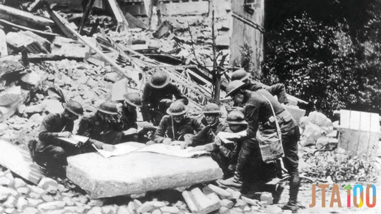 American soldiers discussing the next step in the Battle of the Argonne Forest in 1918.