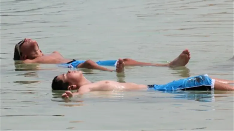 Floating in the Dead Sea