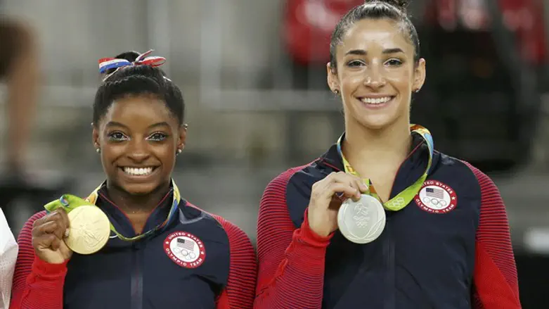 Aly Raisman (at right)