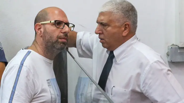 שאול שמאי (משמאל)